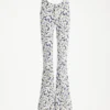 Curved-jeans i denim med blommönster